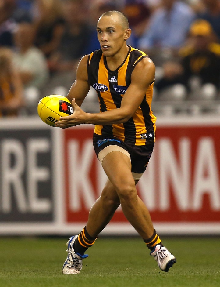 AFL 2014 NAB Challenge - Hawthorn v Brisbane Alex Woodward of the Hawks in action during the 2014 NAB Challenge match between Hawthorn Hawks and the Brisbane Lions at Etihad Stadium, Melbourne on February 13, 2014. (Photo: Michael Willson/AFL Media)